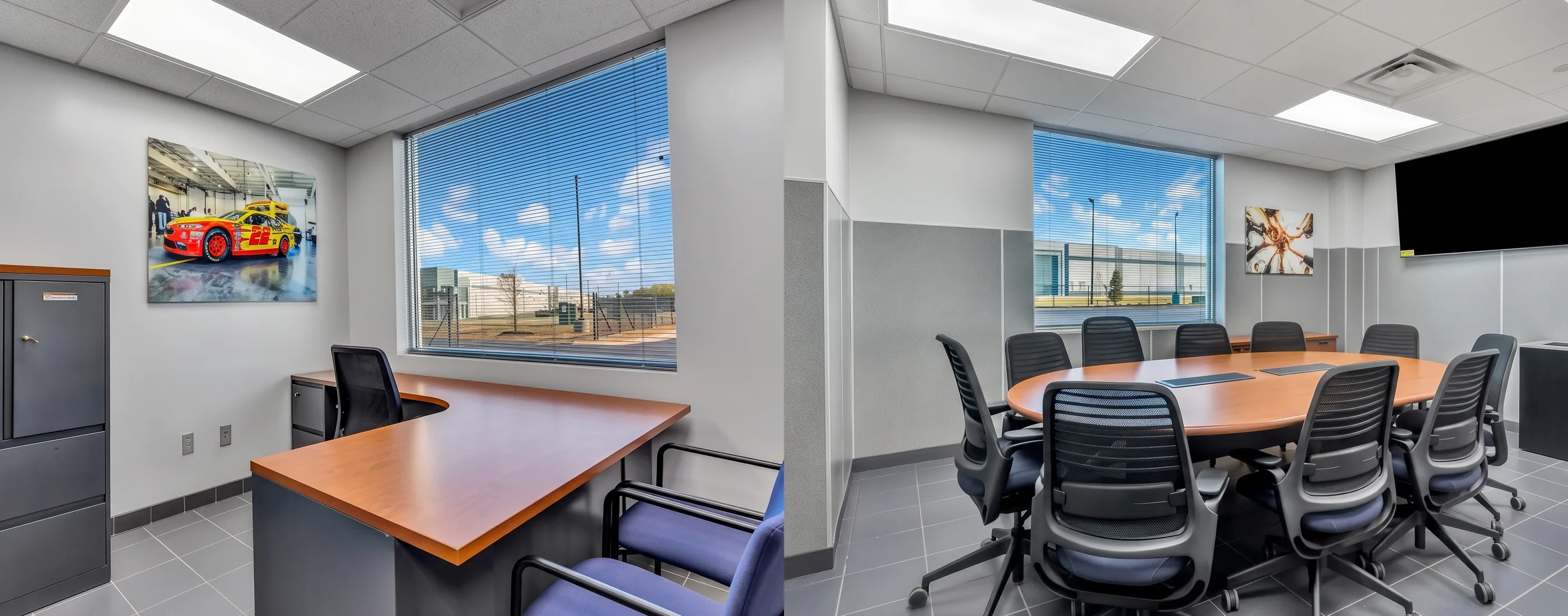 Office with desks and windows looking onto the truck yard