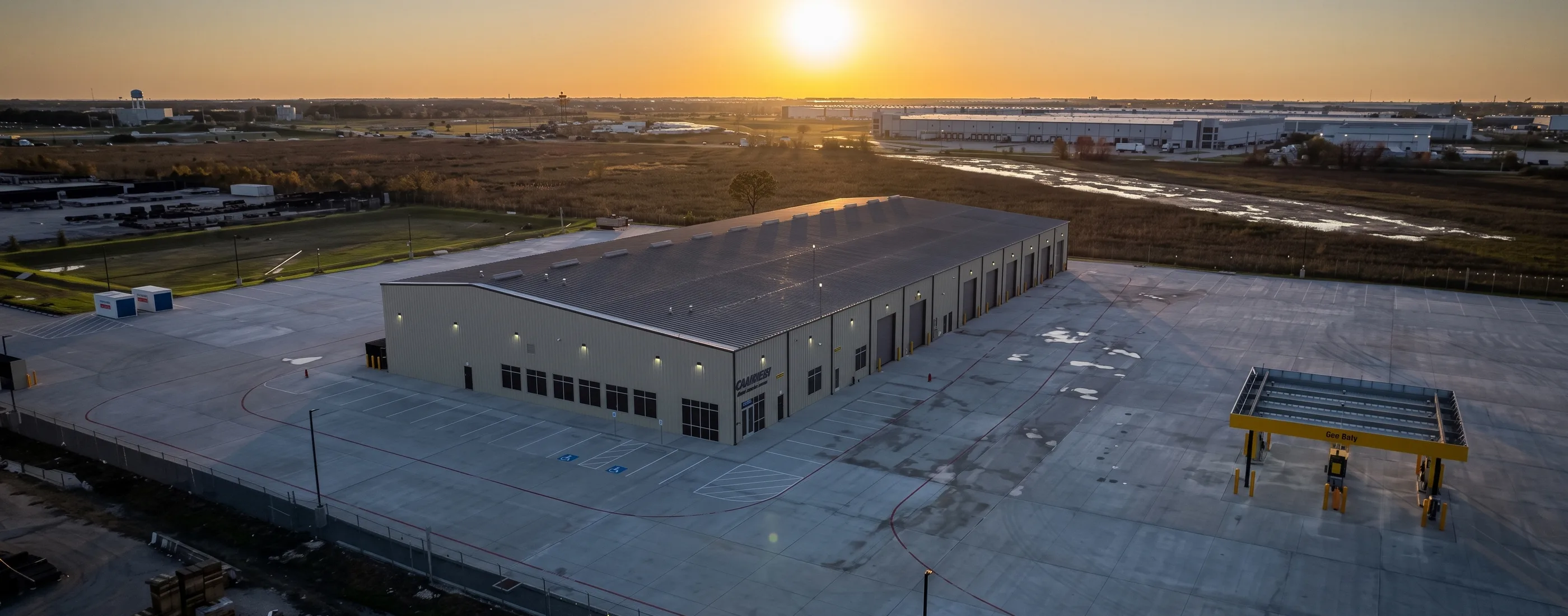 Aerial view of the Penske Katy Service Center and the industrial corridor beyond